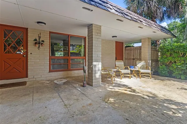 a view of a house with a yard and garage