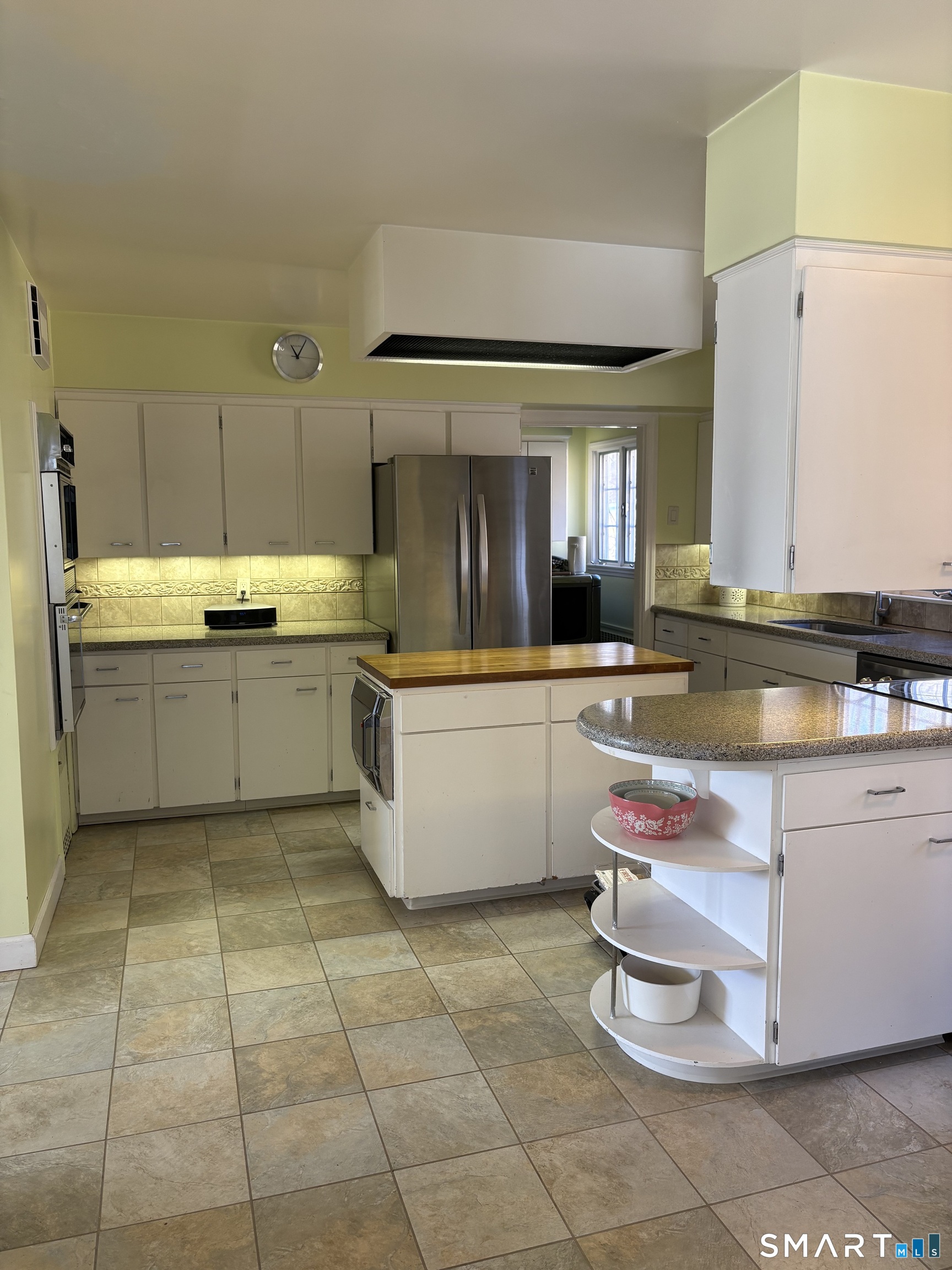 321 Artillery Road Middlebury, CT 06762 - Photo 13 of 15 a kitchen with a sink and cabinets
