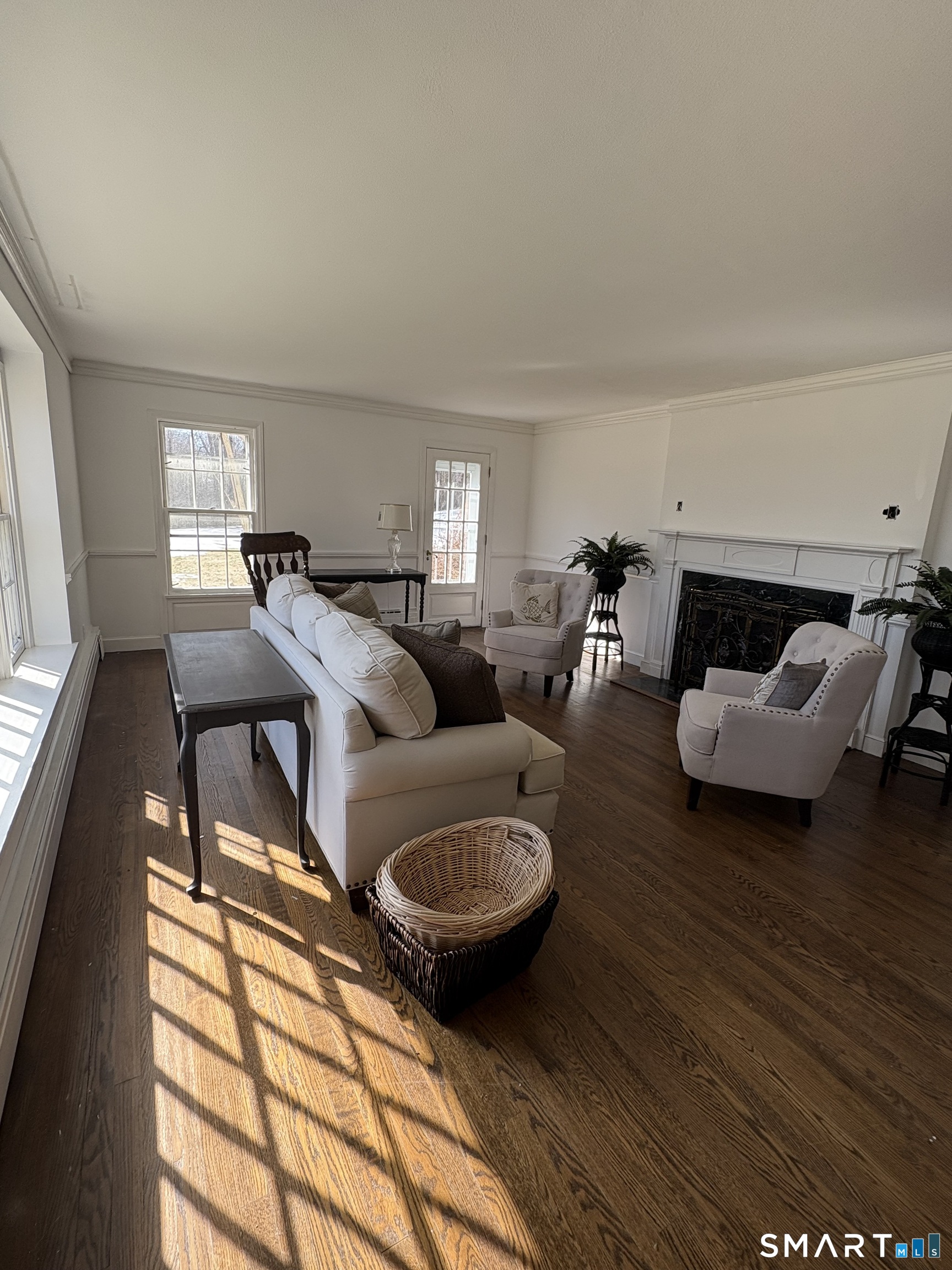 321 Artillery Road Middlebury, CT 06762 - Photo 6 of 15 a living room with furniture and a large window