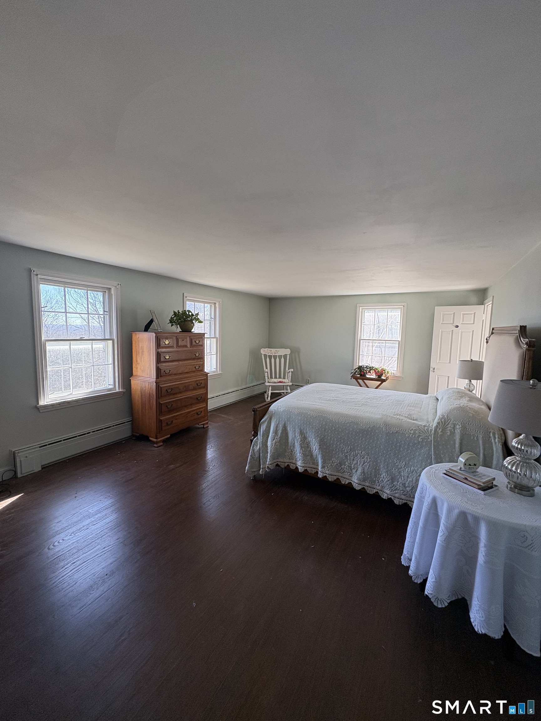 321 Artillery Road Middlebury, CT 06762 - Photo 10 of 15 a spacious bedroom with a bed and window