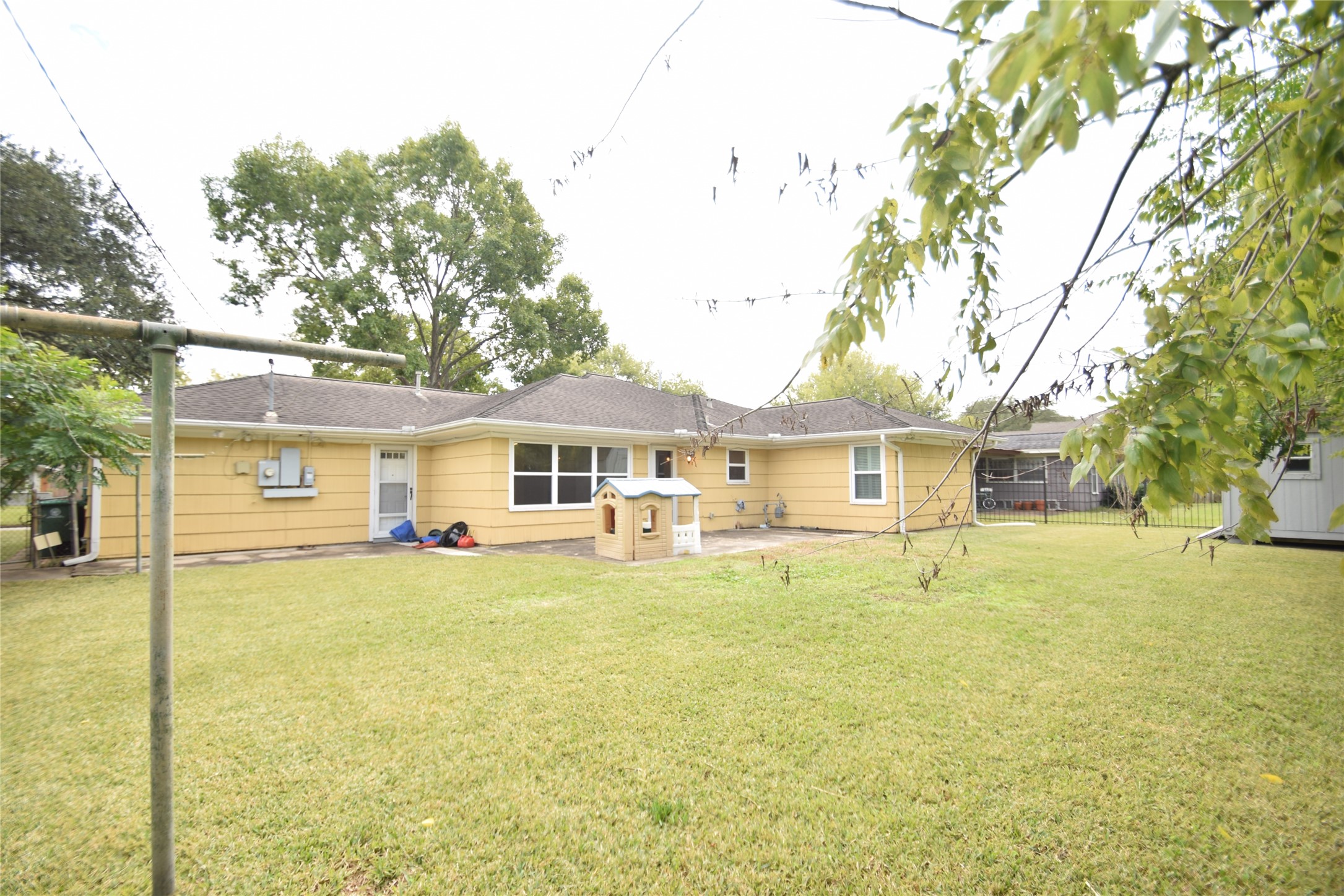 8434 Bluegate Street Houston, TX 77025 - Photo 17 of 28 a front view of a house with swimming pool