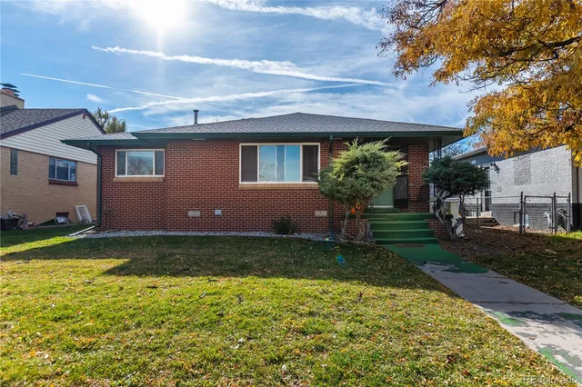 a house view with a garden space
