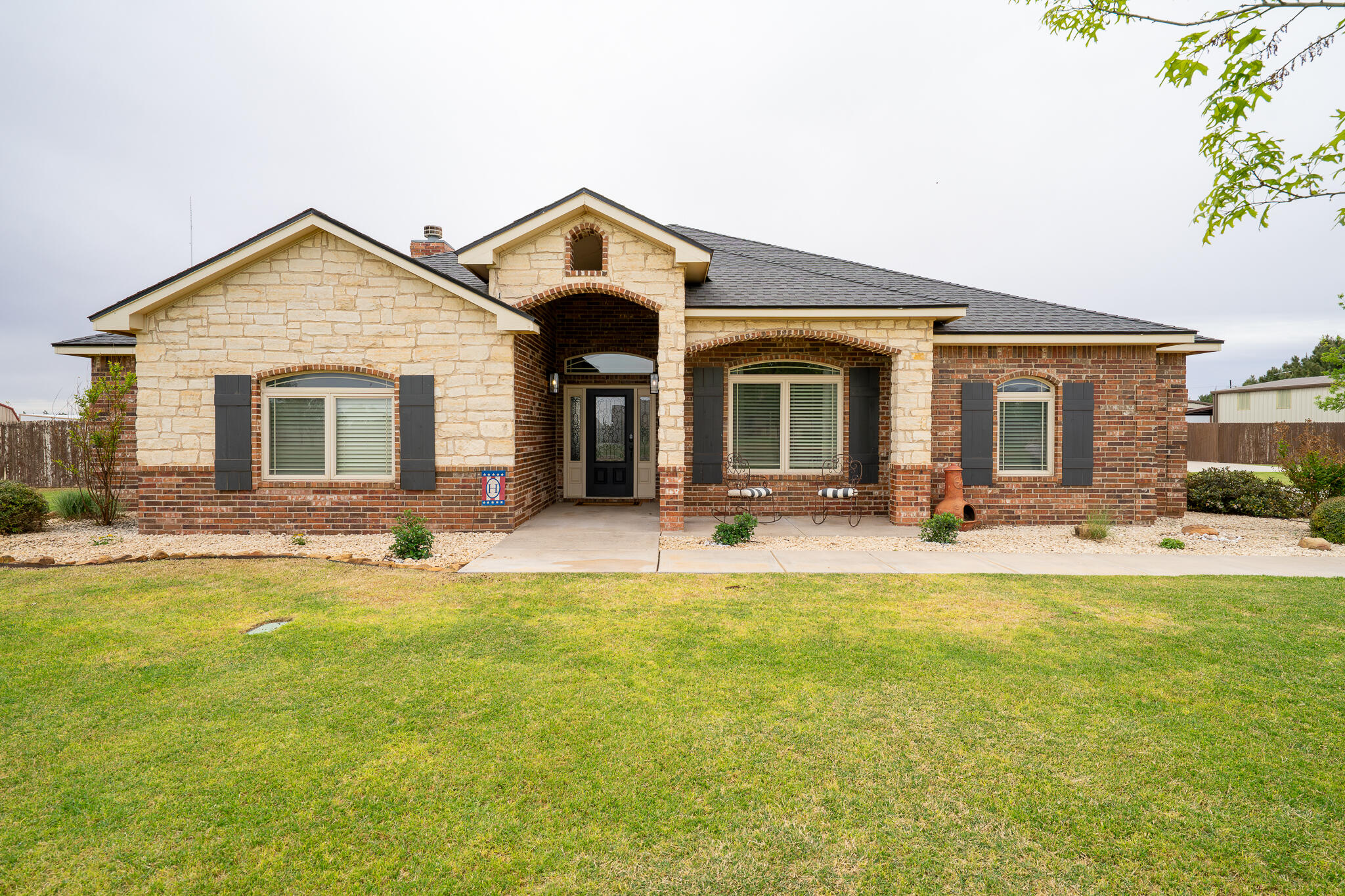 3301 County Road 7560 Lubbock, TX 79423 - Photo 5 of 40 a view of a house with swimming pool and porch with furniture