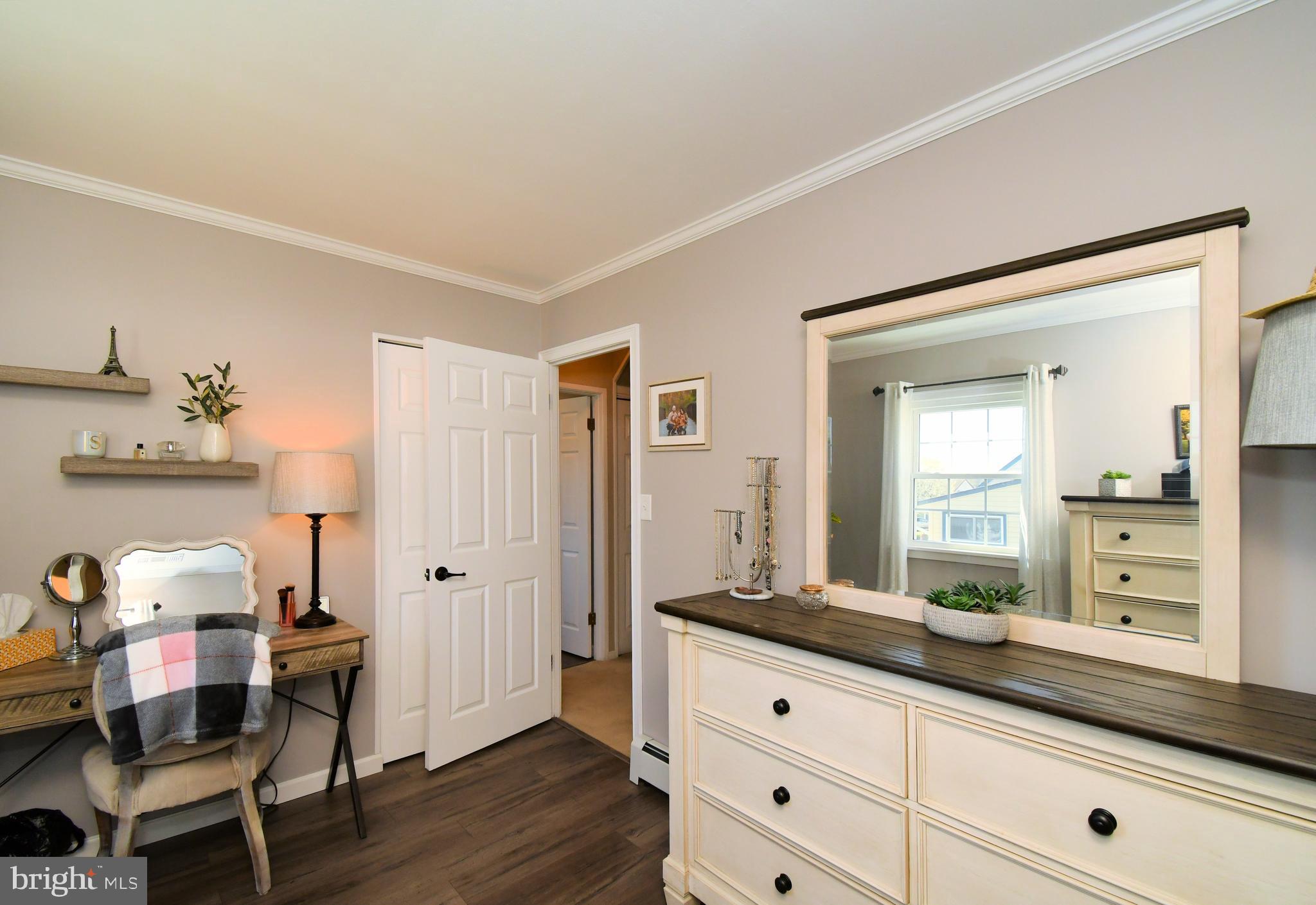20 Conifer Road Levittown, PA 19057 - Photo 24 of 52 a spacious bathroom with a granite countertop sink mirror and a