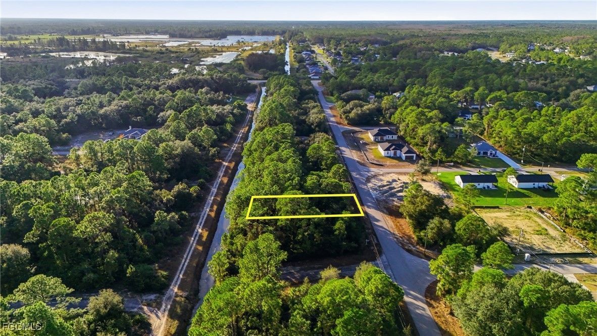2428 Mabry Street Alva, FL 33920 - Photo 17 of 20 an aerial view of a house with a yard