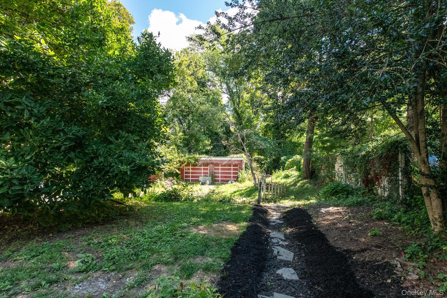 88 South Hamilton Street Poughkeepsie, NY 12601 - Photo 37 of 47 View of yard featuring a wooded view