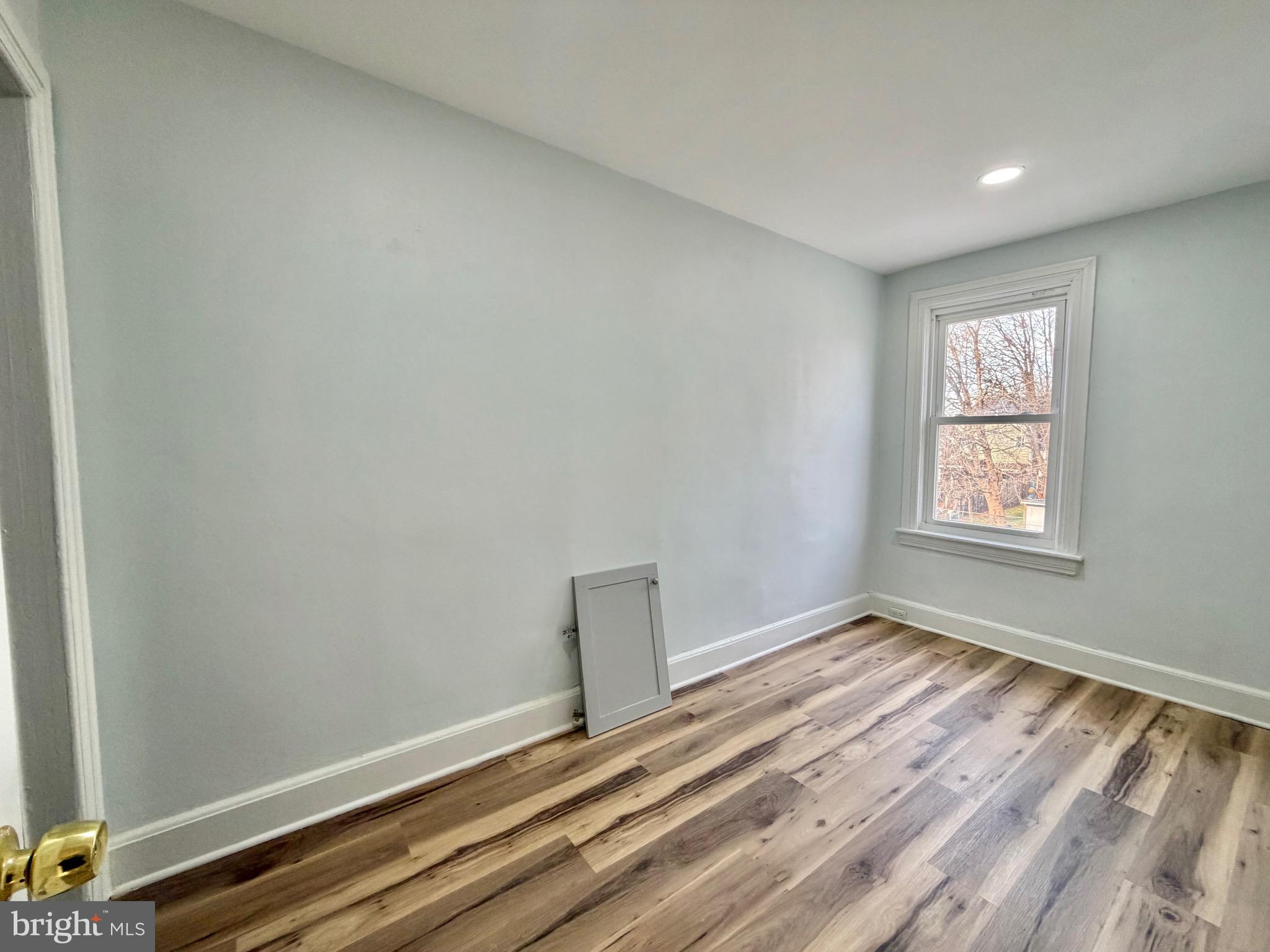 726 Genesee Street Trenton, NJ 08611 - Photo 12 of 15 a view of room with window and stairs
