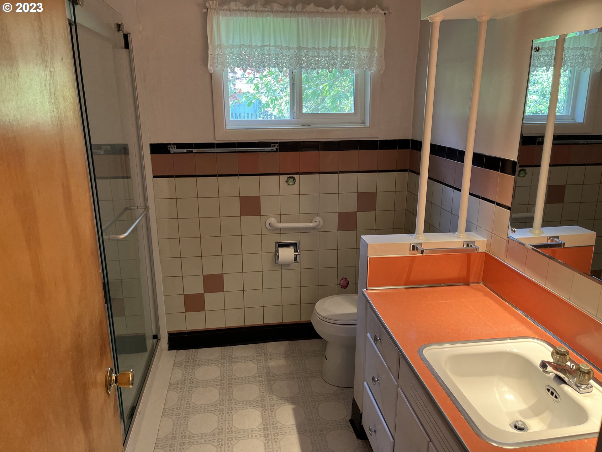 1526 Green Acres Road Eugene, OR 97408 - Photo 5 of 10 a bathroom with a sink toilet and shower