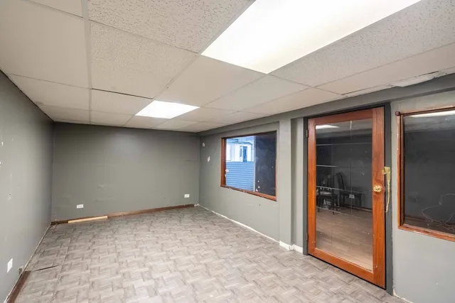 a bathroom with a sink toilet and a mirror