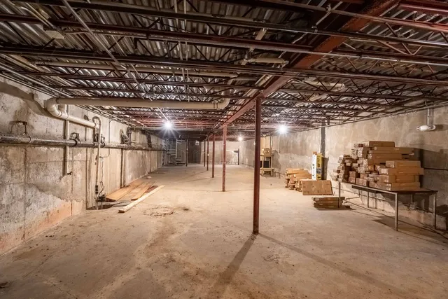 a view of entryway with wooden walls