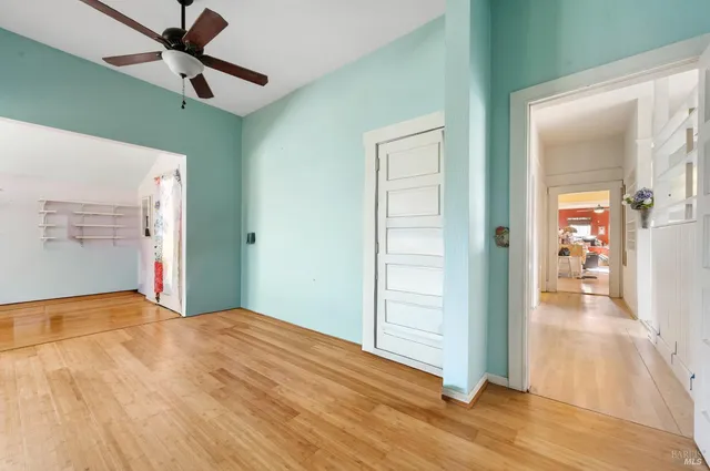 a view of a livingroom with wooden floor