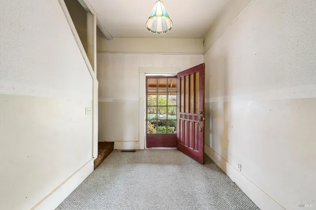 an empty room with windows