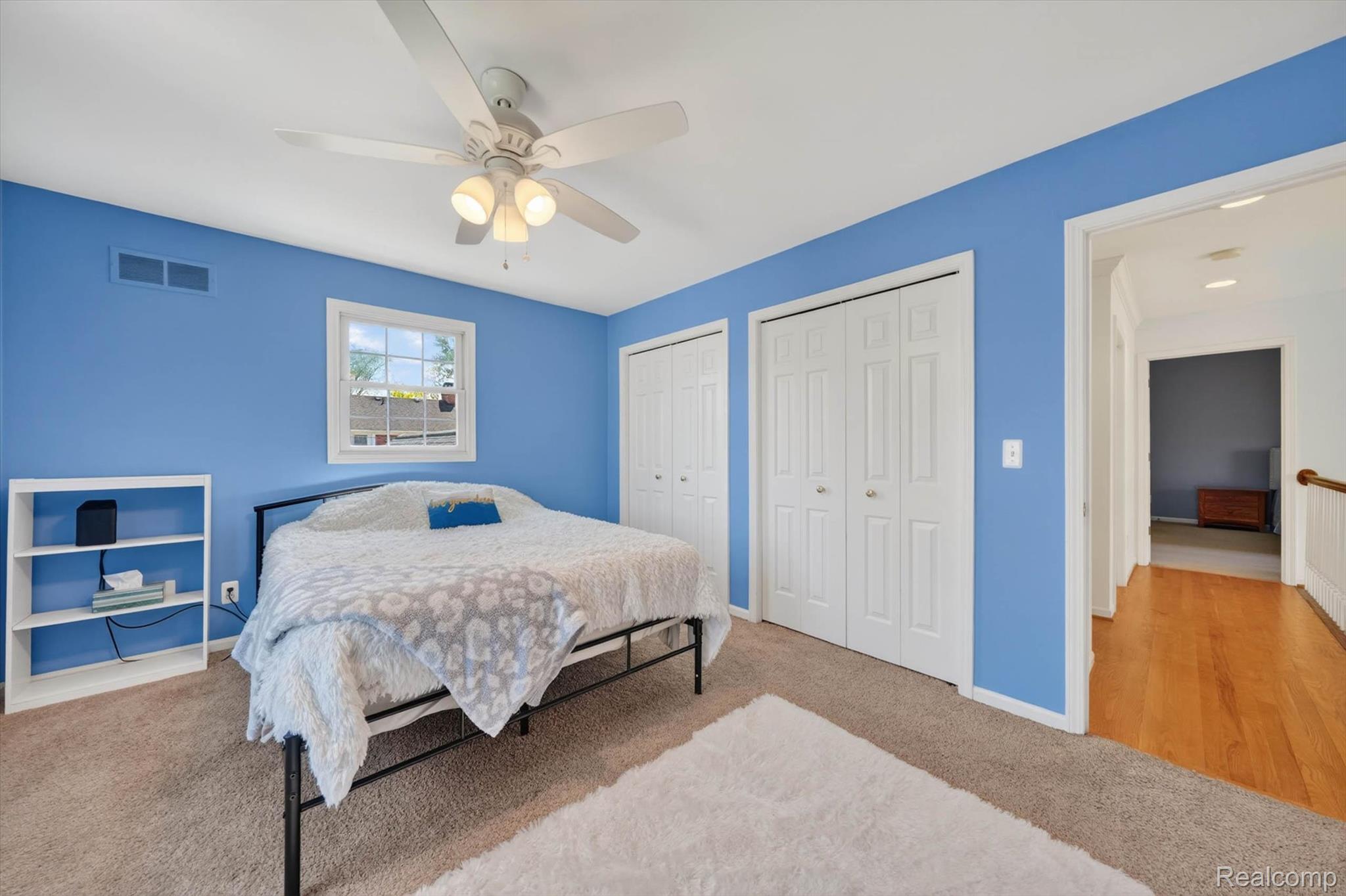 1112 Vernier Road Grosse Pointe, MI 48236 - Photo 20 of 39 Bedroom featuring two closets, carpet, and a ceiling fan