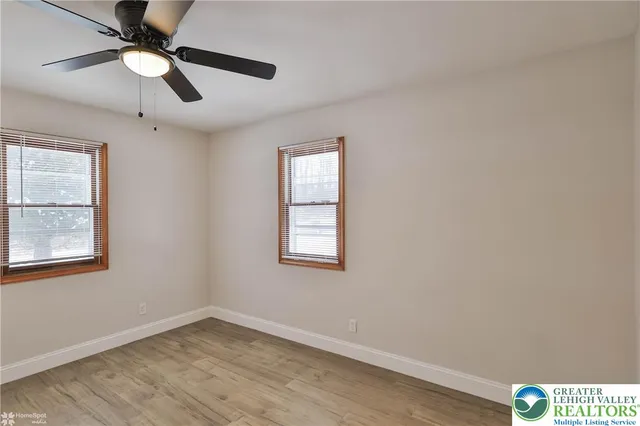 a house with trees in front of it