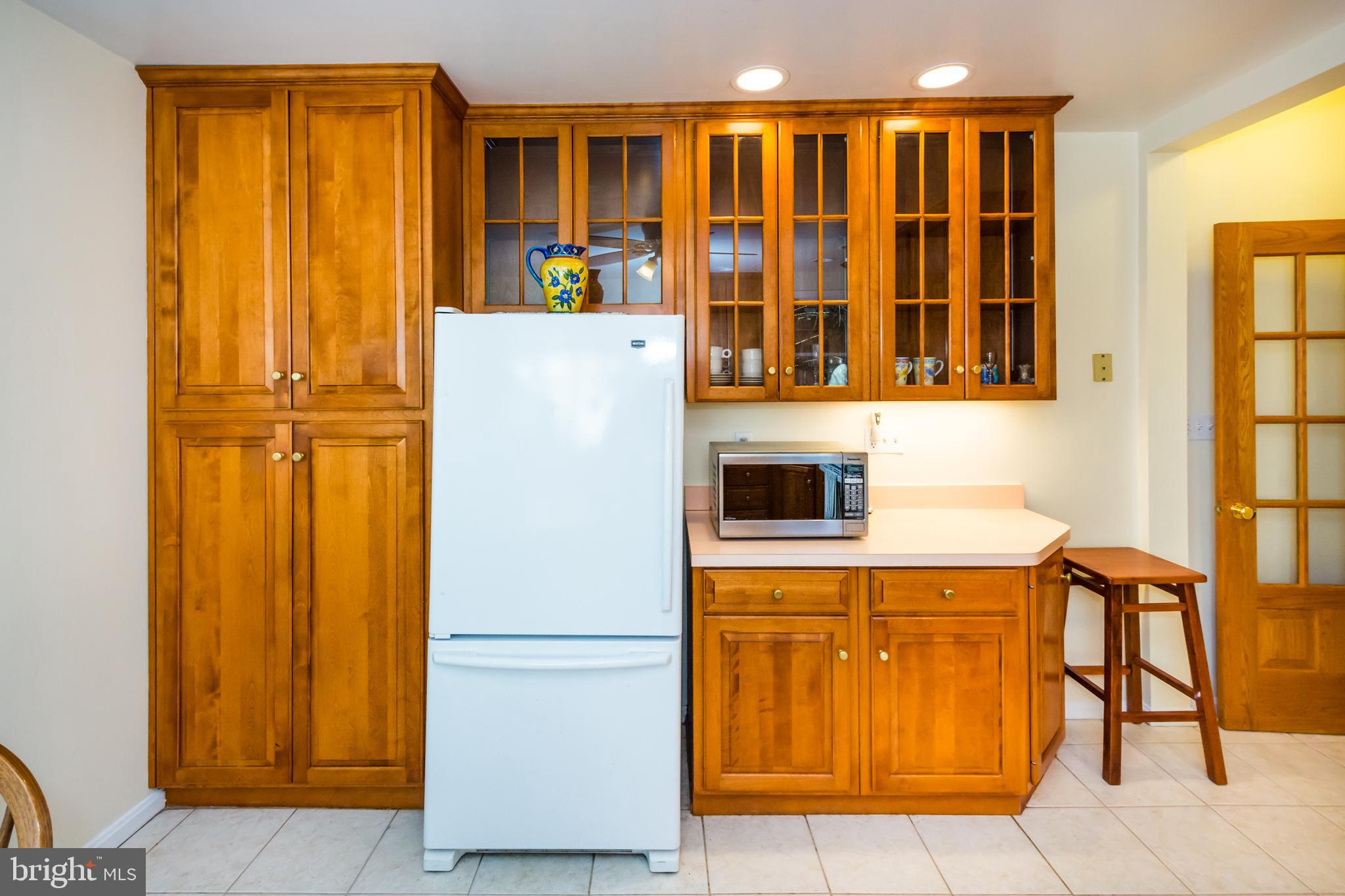 319 Woodlawn Road Baltimore, MD 21210 - Photo 33 of 66 Custom birch wood cabinets, Rojahn Company.