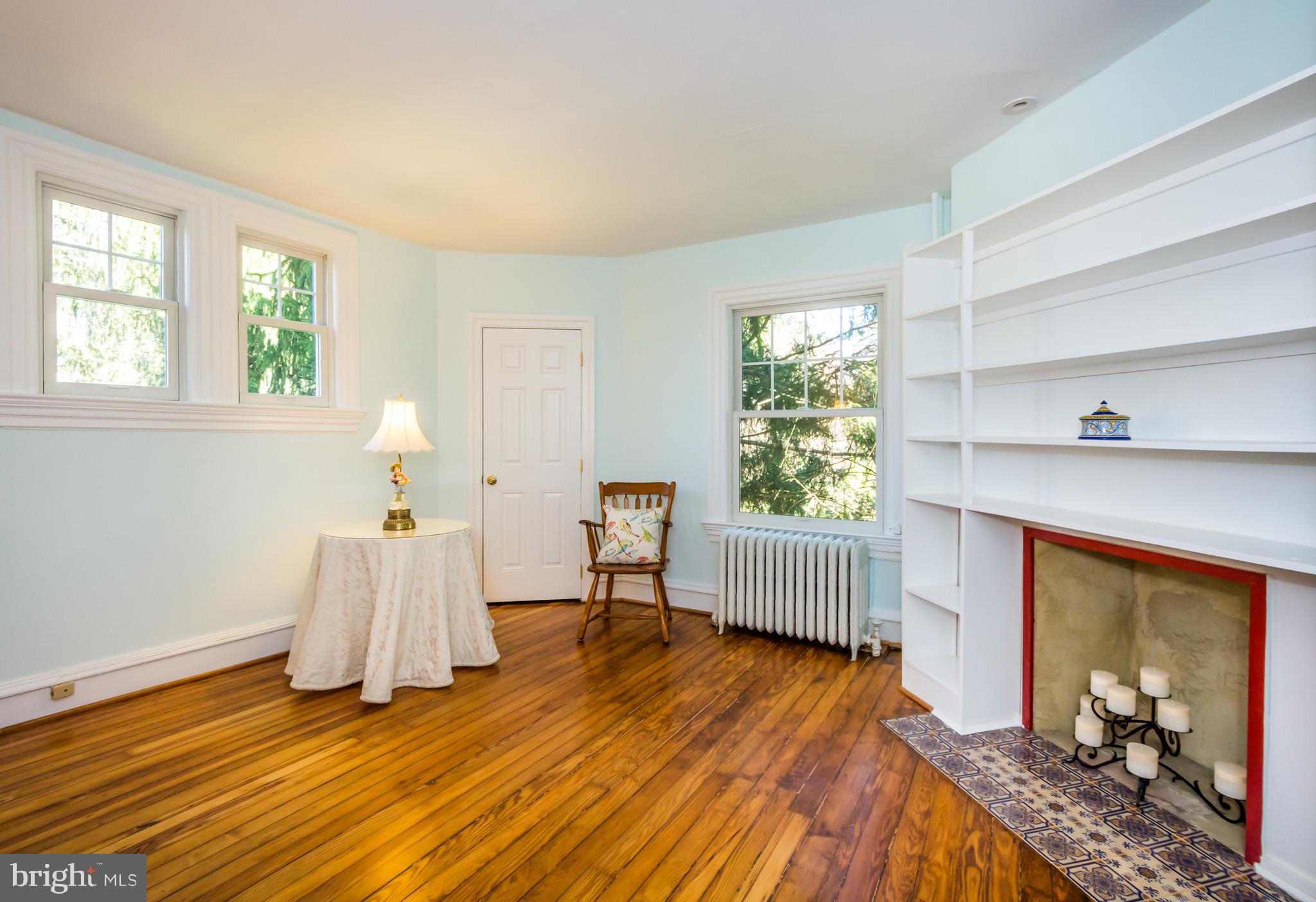 319 Woodlawn Road Baltimore, MD 21210 - Photo 51 of 66 Third Bedroom with built-ins, decorative FP.