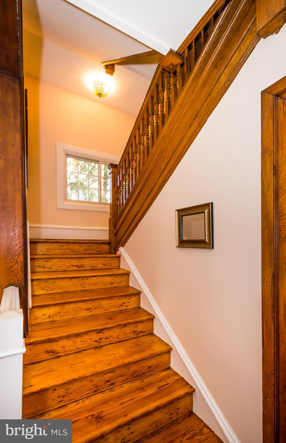 319 Woodlawn Road Baltimore, MD 21210 - Photo 56 of 66 Impeccably maintained wood staircase.