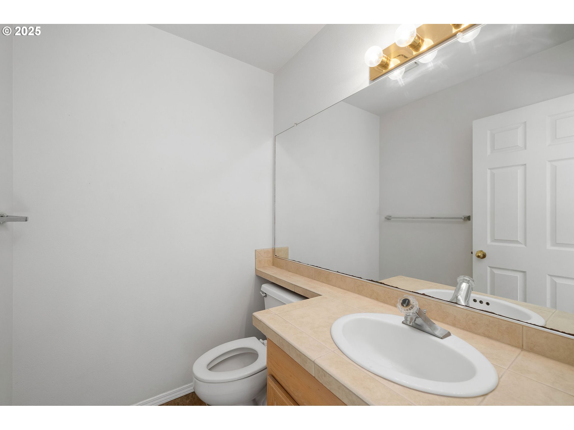 236 South Sweeney Street Portland, OR 97239 - Photo 14 of 29 a bathroom with a sink and a toilet