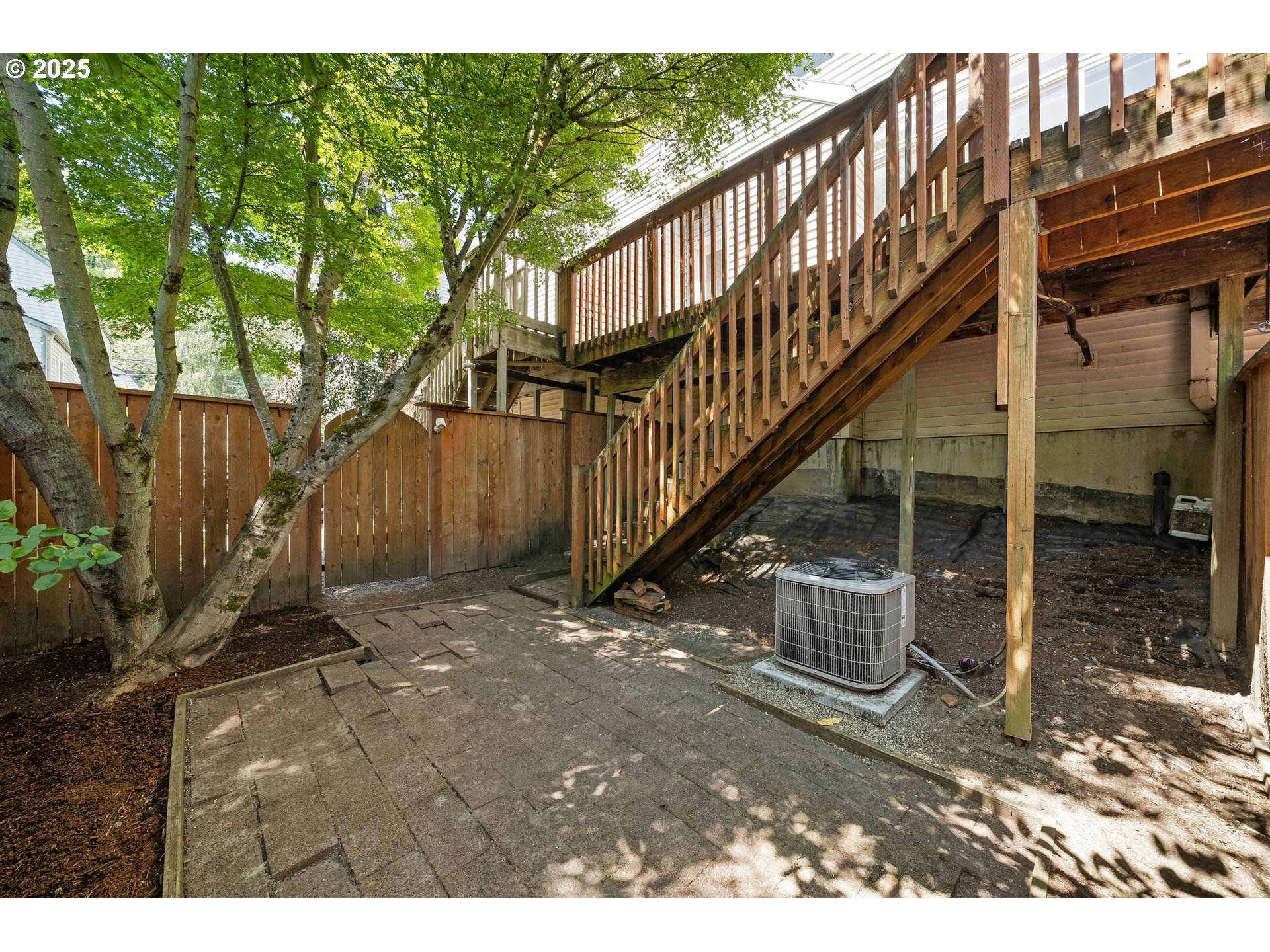 236 South Sweeney Street Portland, OR 97239 - Photo 27 of 29 a view of an house with backyard and deck