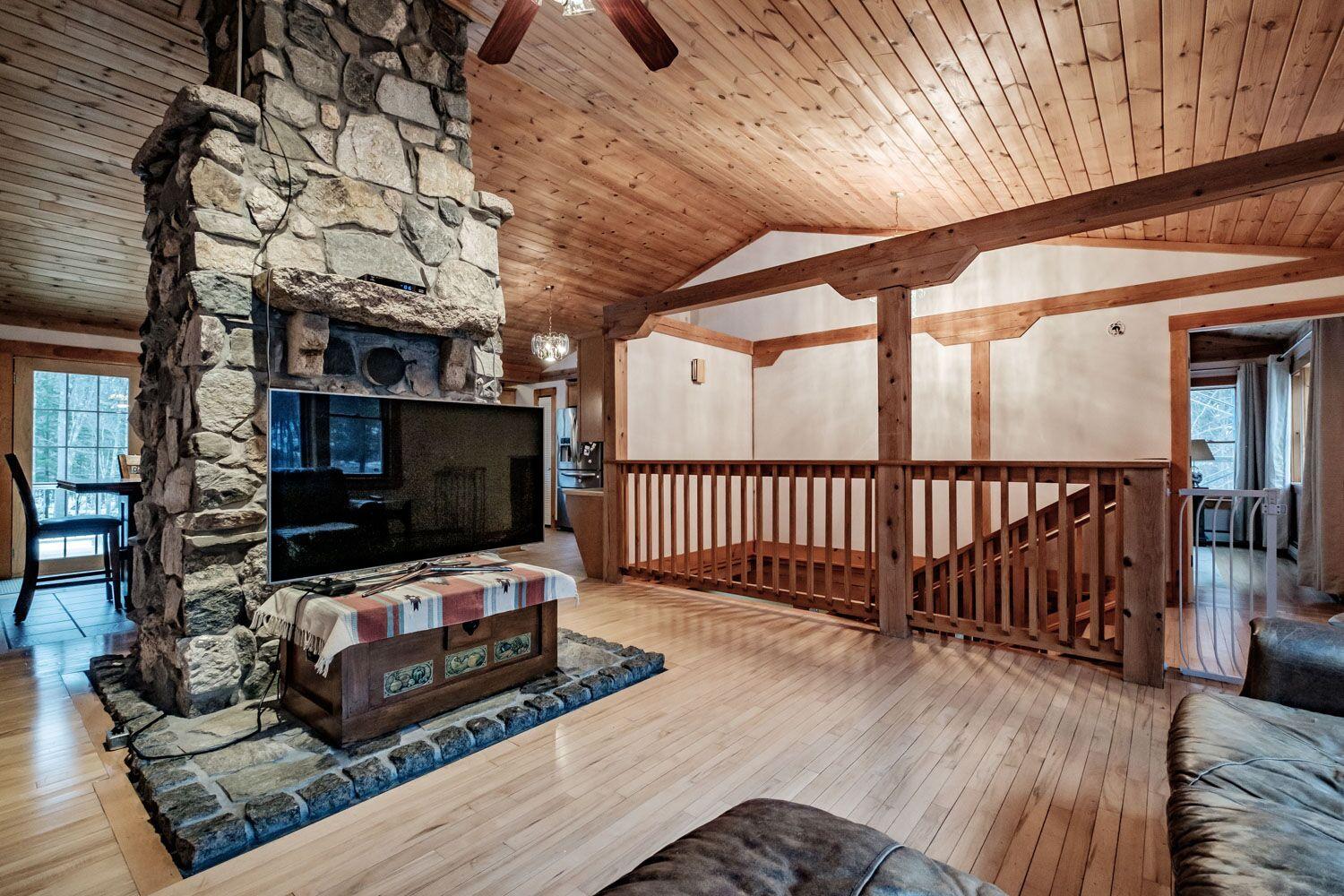 374 Songo School Road Naples, ME 04055 - Photo 18 of 25 Stone Fireplace/Living area