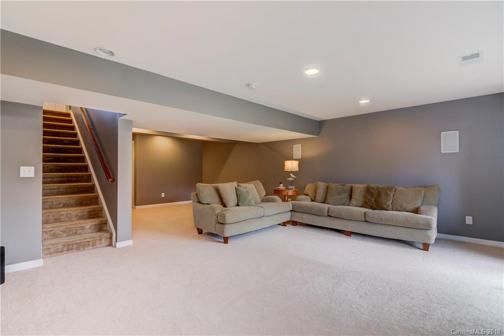 7512 West Berkeley Road Denver, NC 28037 - Photo 24 of 32 a living room with furniture and a wooden floor