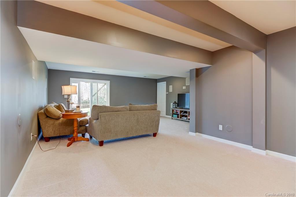 7512 West Berkeley Road Denver, NC 28037 - Photo 26 of 32 a living room with furniture and window