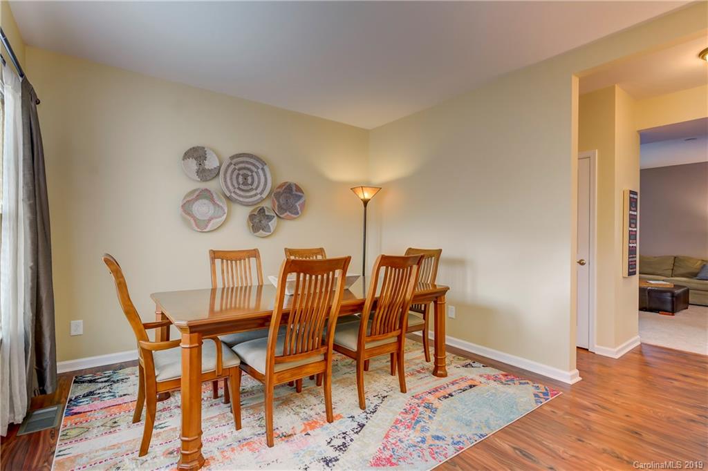 7512 West Berkeley Road Denver, NC 28037 - Photo 6 of 32 a view of a dining room with furniture