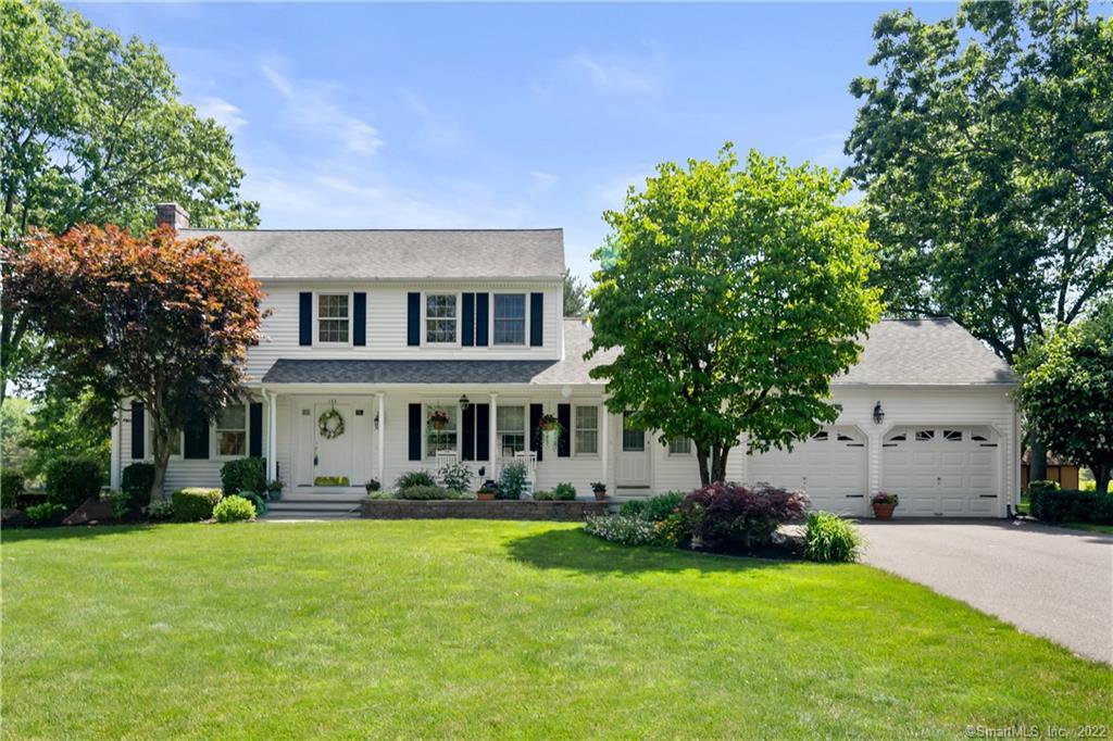 133 Tripp Road Ellington, CT 06029 - Photo 1 of 1 a front view of a house with garden