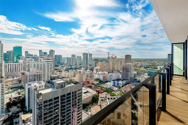 a view of a balcony with city