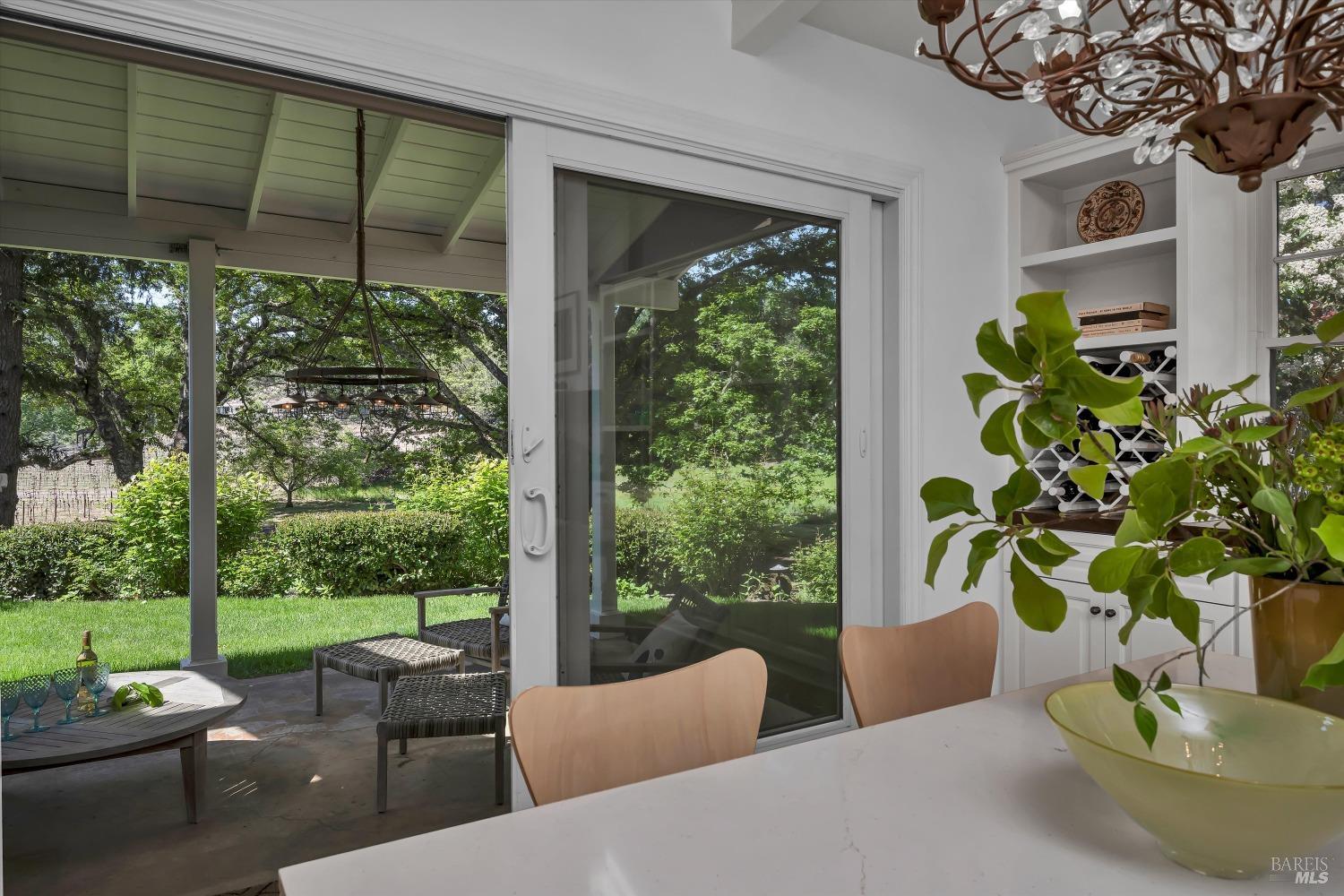 1065 Summit Lake Drive Angwin, CA 94508 - Photo 12 of 47 a view of a porch with furniture and a yard