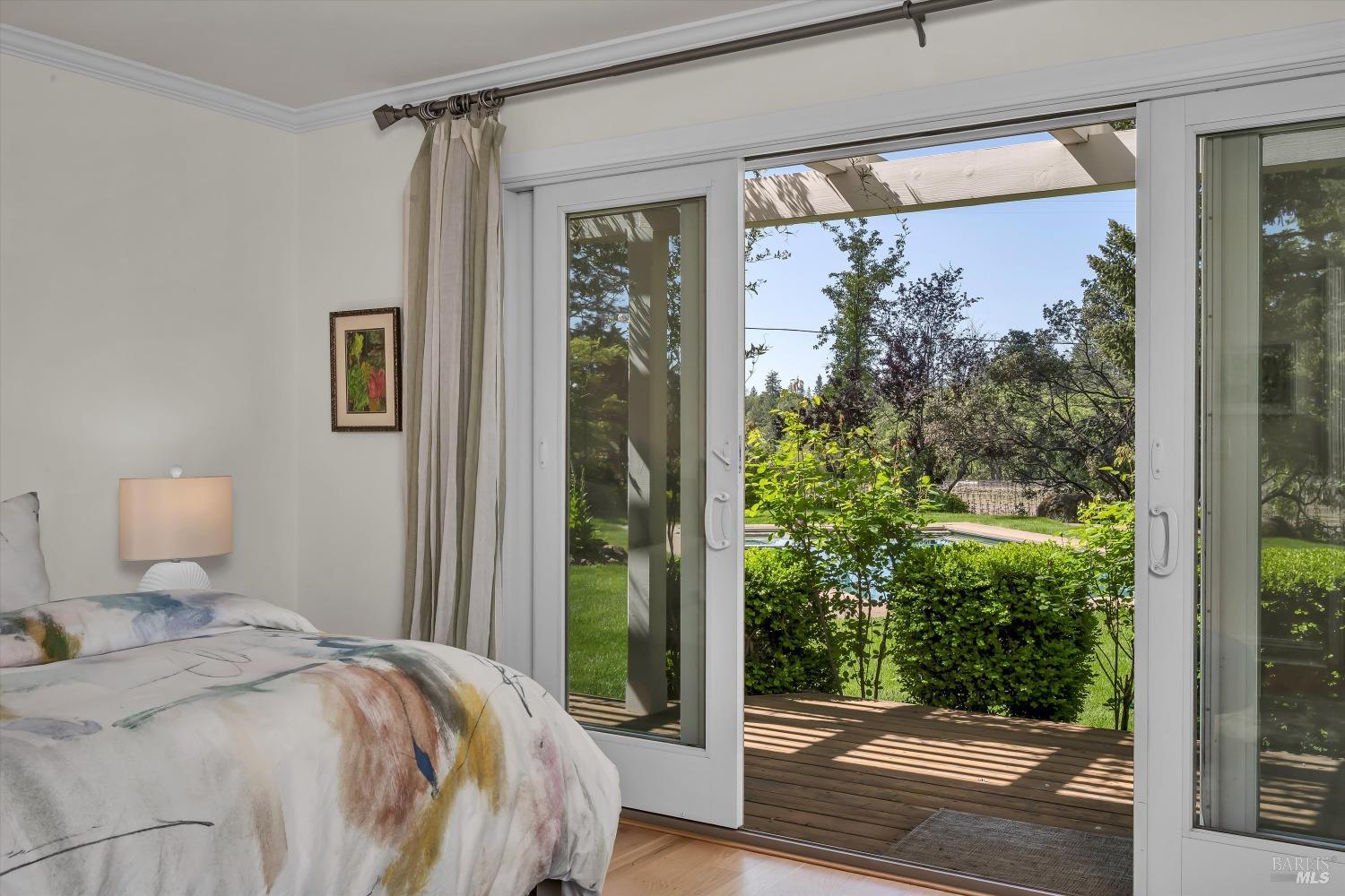 1065 Summit Lake Drive Angwin, CA 94508 - Photo 23 of 47 a bedroom with a bed and a window