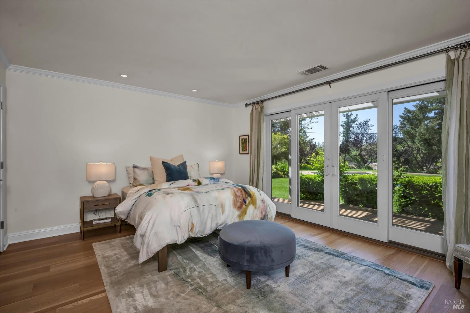 1065 Summit Lake Drive Angwin, CA 94508 - Photo 25 of 47 a spacious bedroom with a bed and glass window