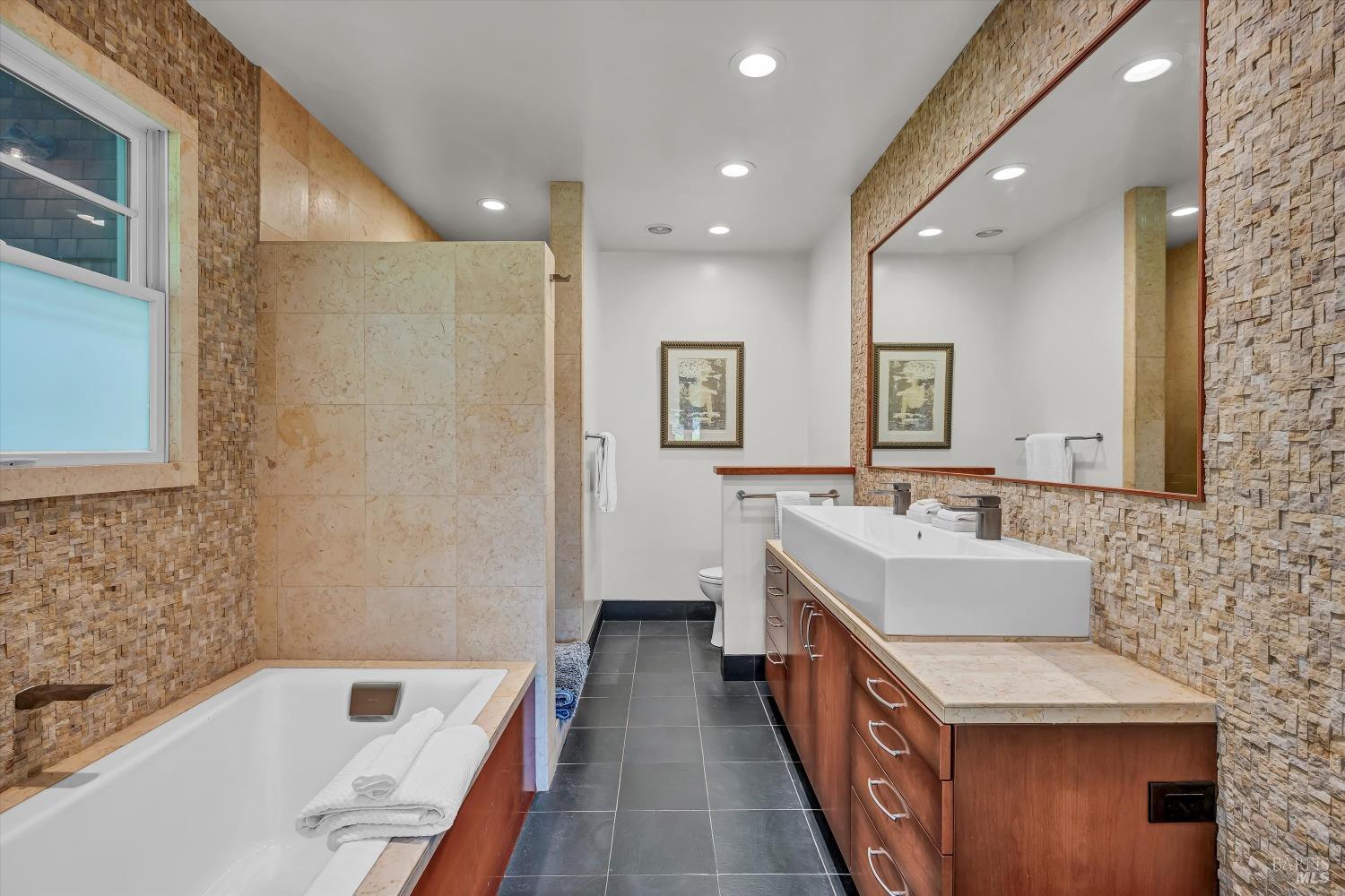 1065 Summit Lake Drive Angwin, CA 94508 - Photo 27 of 47 a bathroom with a tub sink and mirror