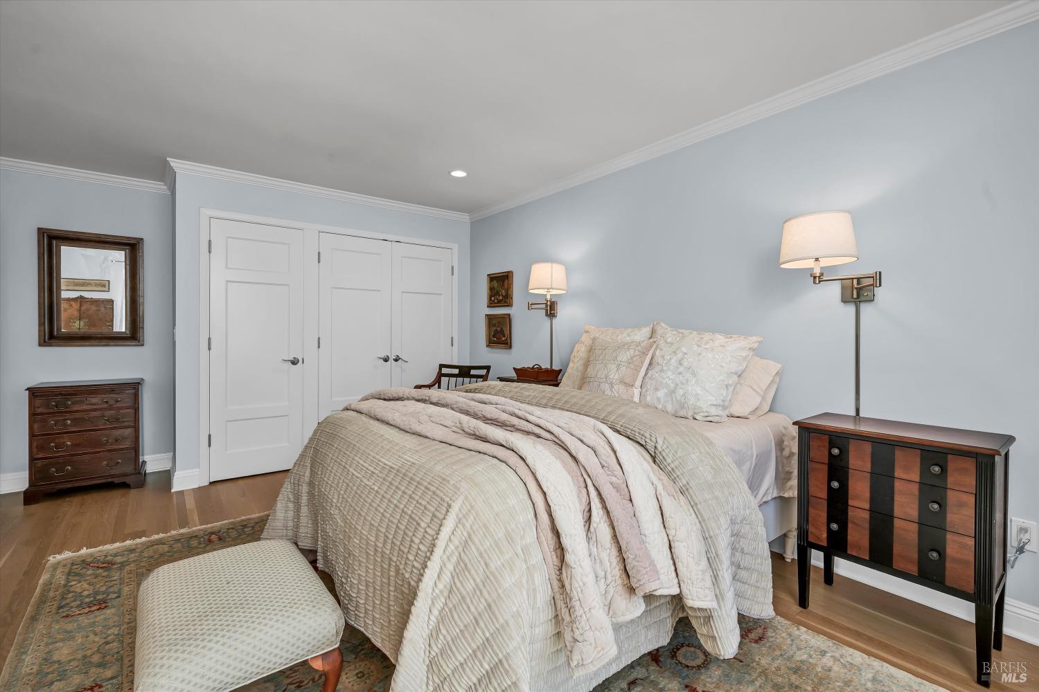 1065 Summit Lake Drive Angwin, CA 94508 - Photo 31 of 47 a bedroom with a bed and a lamp