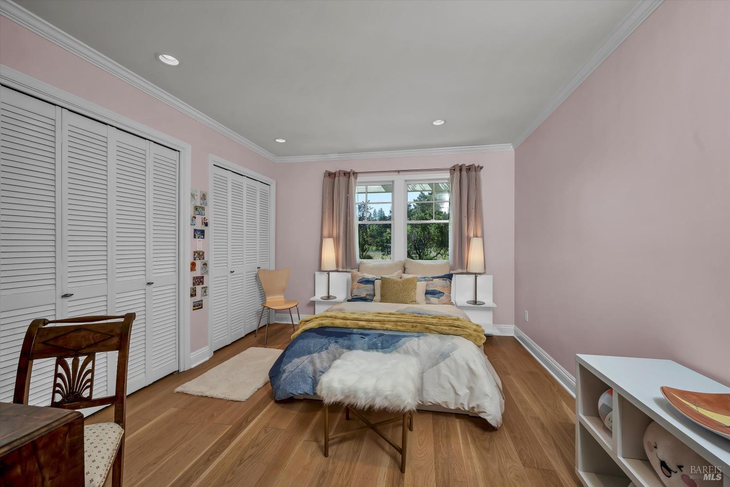 1065 Summit Lake Drive Angwin, CA 94508 - Photo 33 of 47 a bed sitting in a spacious bedroom next to a window