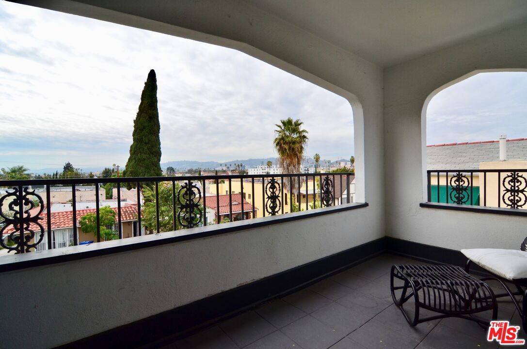 856 Serrano Place Los Angeles, CA 90029 - Photo 2 of 11 a view of roof deck with furniture