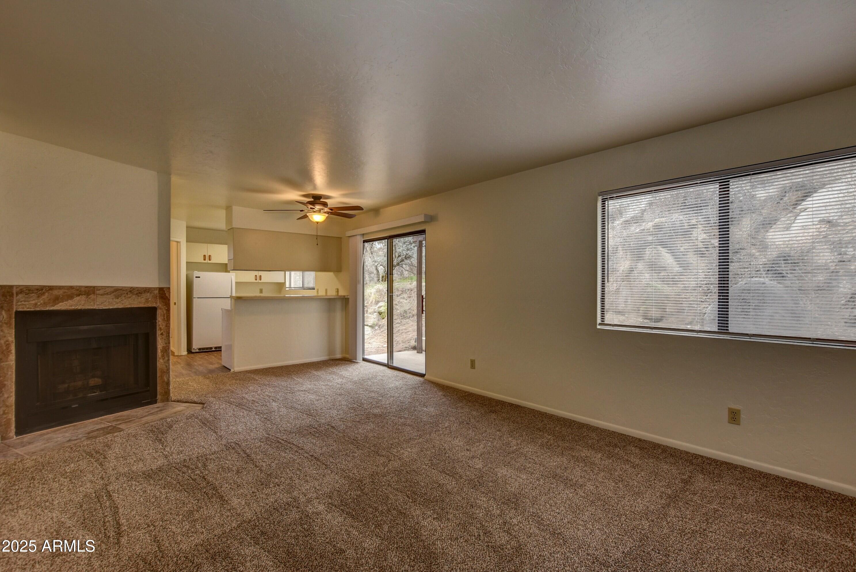 799 Sanctuary Road Prescott, AZ 86305 - Photo 14 of 57 Sanctuary 2 living to kitchen