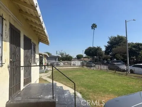 a view of a swimming pool with chairs