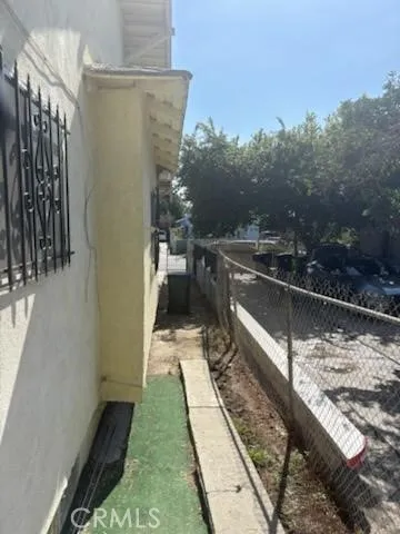 a view of a balcony with a sink