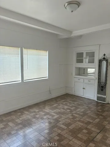 a view of empty room with windows