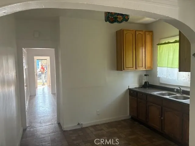 a kitchen with a sink and cabinets