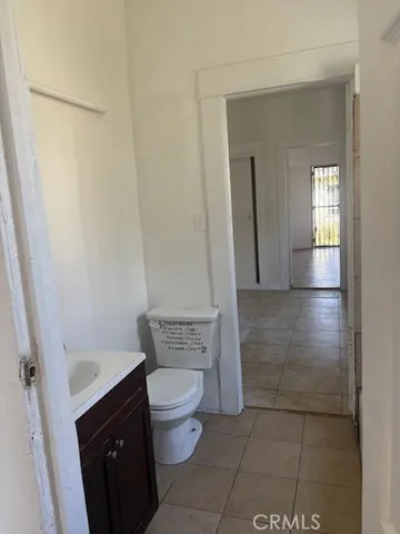 a bathroom with a toilet and a sink