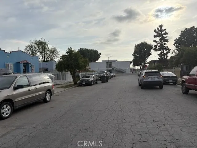 a view of car parked in front of a house