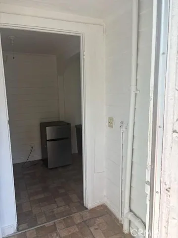 a view of storage and utility room with washer and dryer