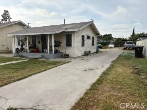 a bedroom with bed and a window