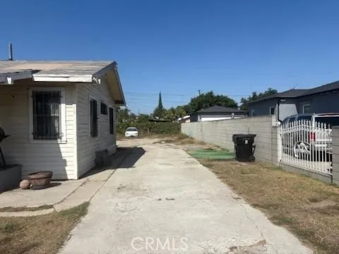 a view of a swimming pool with chairs