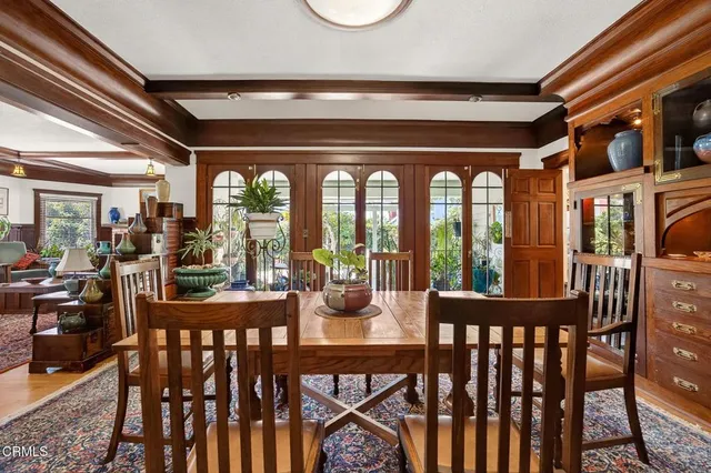 a view of a chairs and tables in a patio