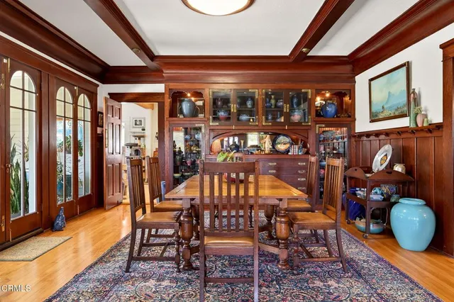 a view of a dining room with furniture window and outside view