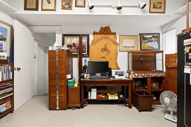 a view of a building with sitting area