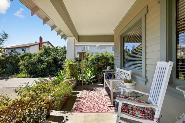a outdoor living space with furniture and a potted plant
